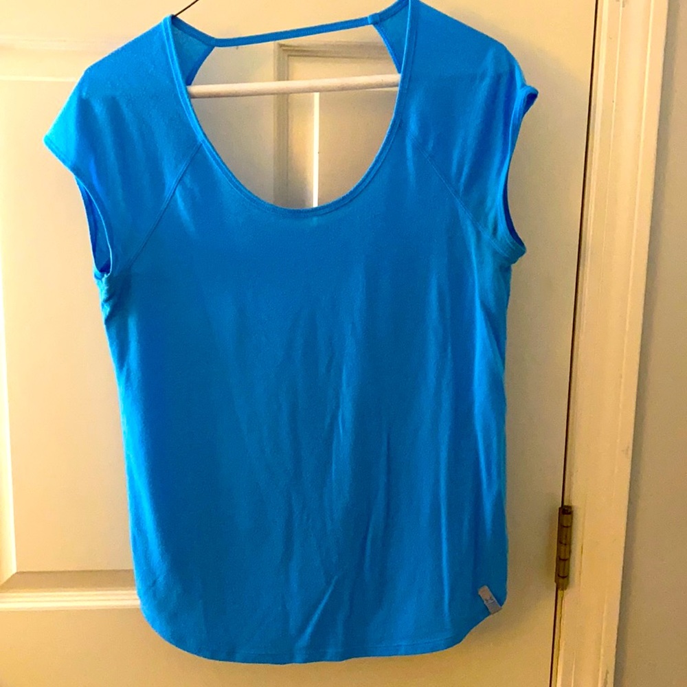 Bright blue open back work out shirt